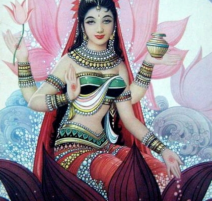 Lakshmi seated on and holding lotus blossoms